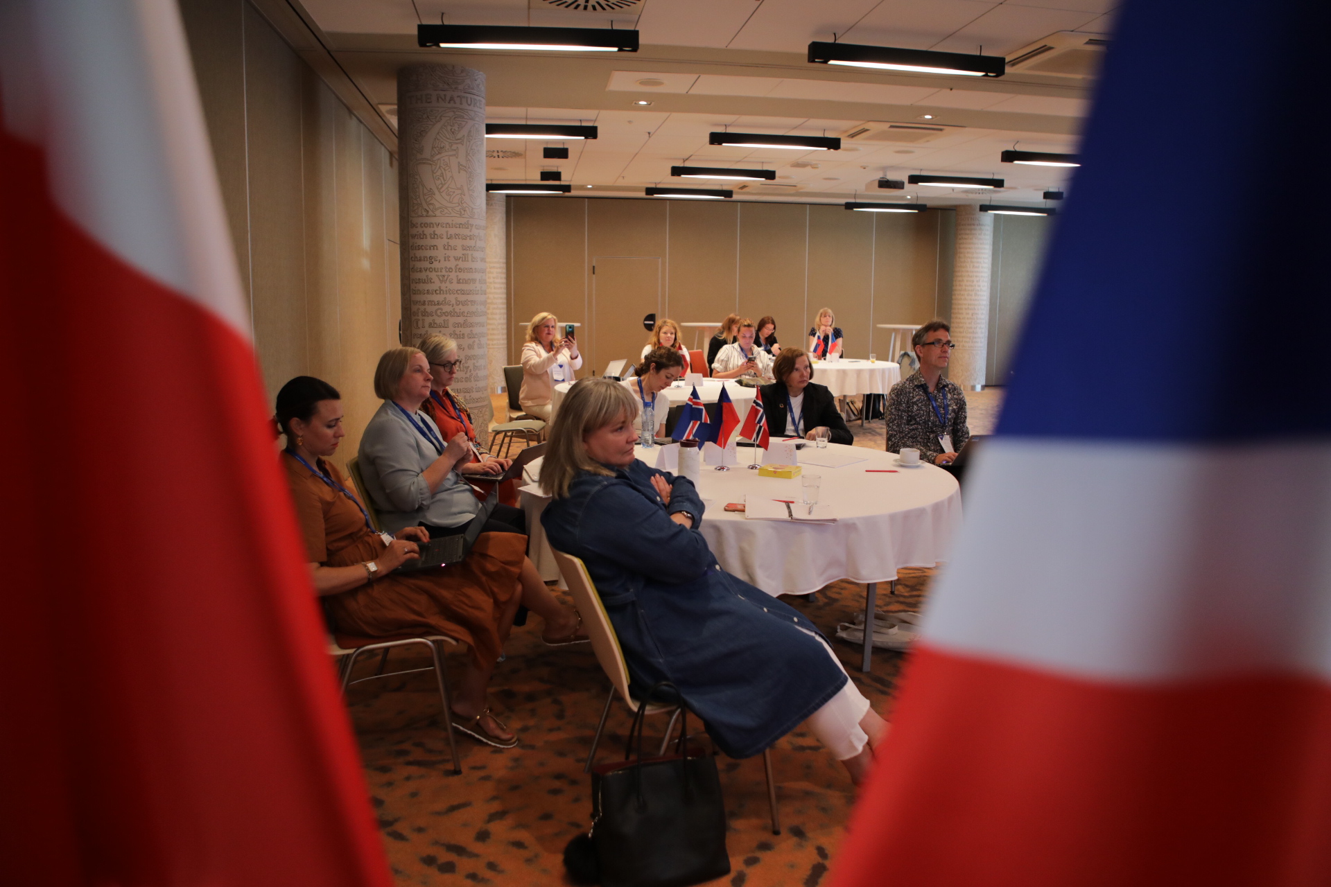 Group of people around the tables