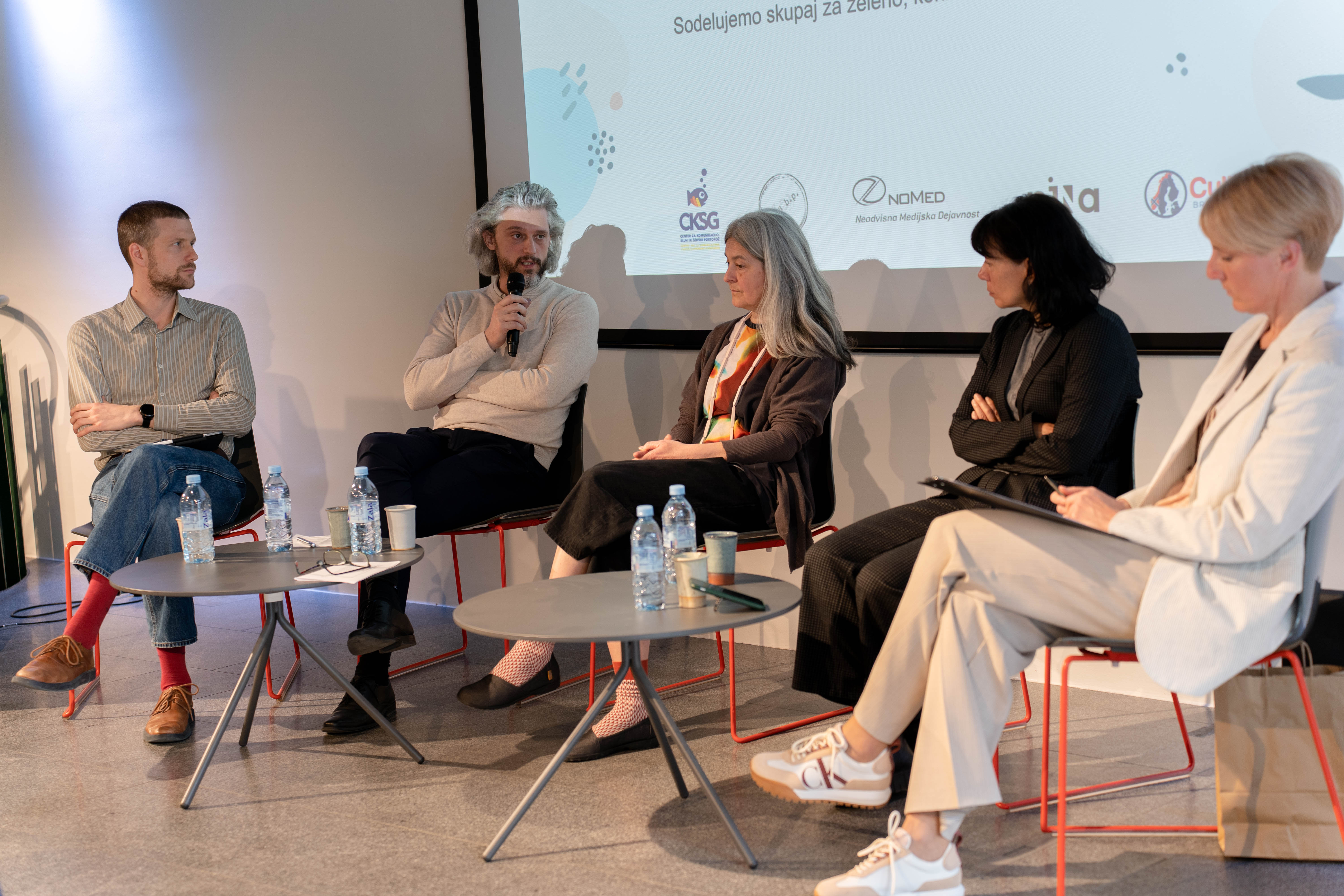 Round table speakers during the discussion.